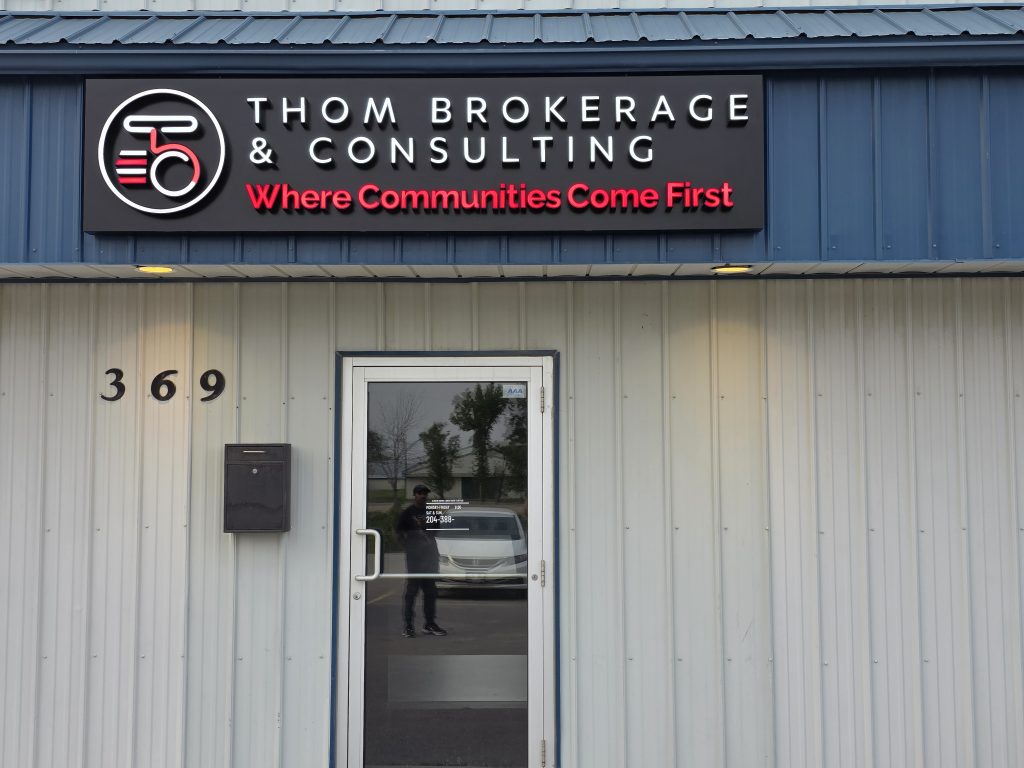 Thom Brokerage & Consulting storefront sign by Ledion